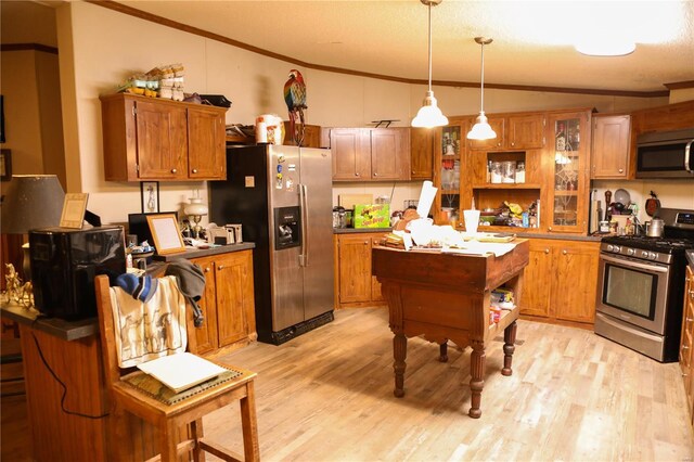 25125 Ash Dr, Grovespring, MO 65662 - kitchen featuring appliances with stainless steel finishes, ornamental molding, lofted ceiling, light wood-style floors, and brown cabinets