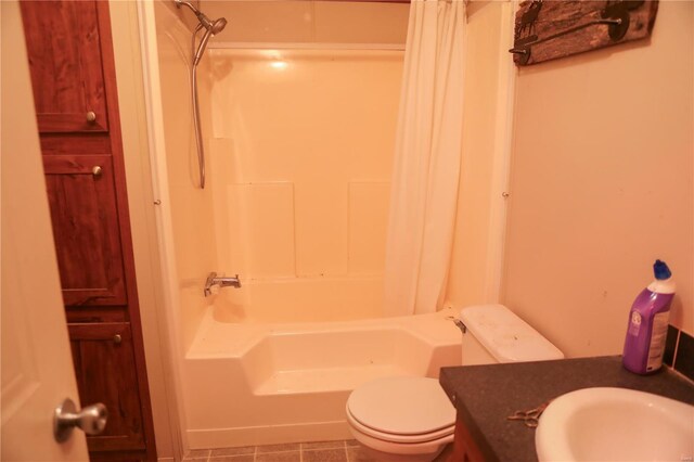 25125 Ash Dr, Grovespring, MO 65662 - bathroom with toilet, shower / bath combo, tile patterned flooring, and a sink