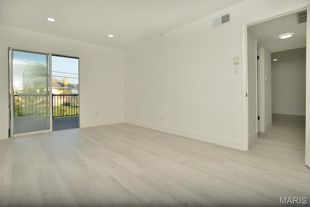 1680 Herault Pl Unit F, Saint Louis, MO 63125 - unfurnished room with light wood-style flooring, baseboards, and recessed lighting