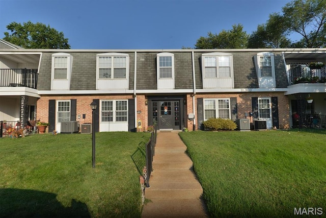 1680 Herault Pl Unit F, Saint Louis, MO 63125 - multi unit property with mansard roof, cooling unit, and brick siding