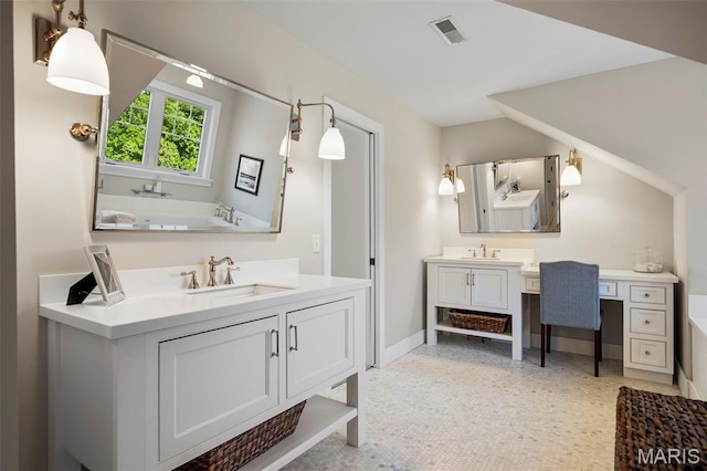 1178 Turnberry Dr, Innsbrook, MO 63390 - full bath featuring two vanities, a garden tub, and baseboards