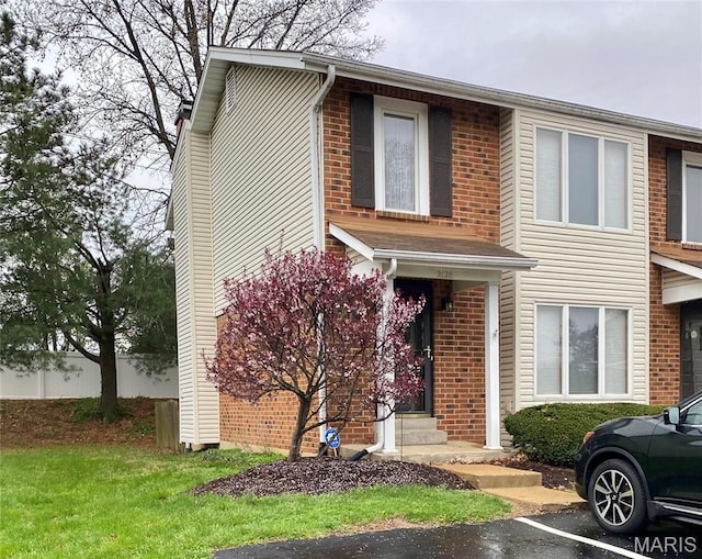 2128 Friendship Ct, Florissant, MO 63031 - view of property with brick siding