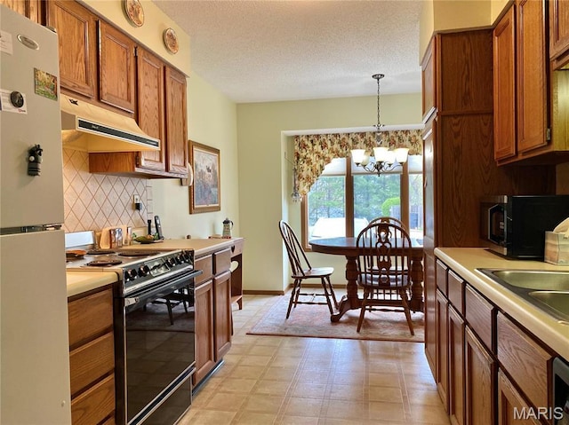 2128 Friendship Ct, Florissant, MO 63031 - kitchen featuring black appliances, under cabinet range hood, brown cabinets, light countertops, and a textured ceiling