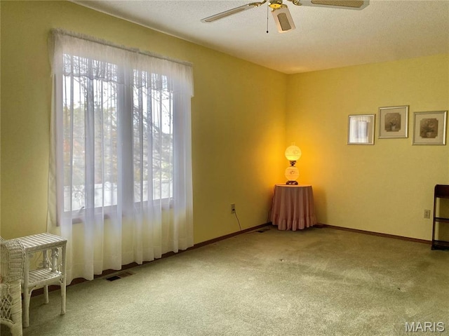 2128 Friendship Ct, Florissant, MO 63031 - carpeted empty room with a ceiling fan and baseboards
