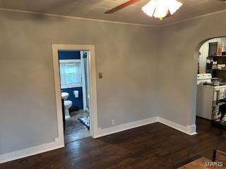 7503 Urbain, Sesser, IL 62865 - unfurnished dining area with a ceiling fan, baseboards, arched walkways, wood finished floors, and crown molding