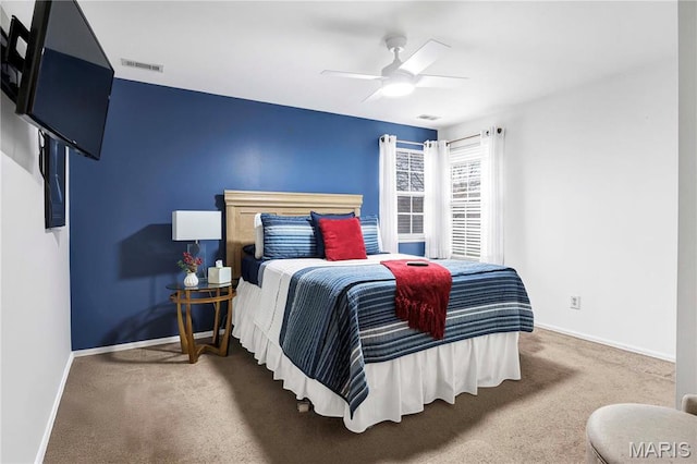 3110 Autumn Shores Dr, Maryland Heights, MO 63043 - carpeted bedroom with baseboards and ceiling fan