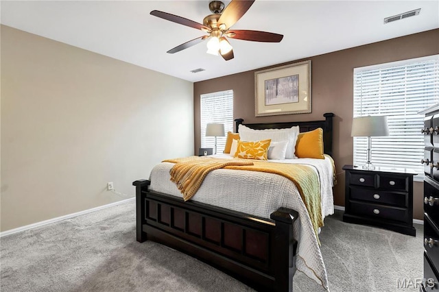 3110 Autumn Shores Dr, Maryland Heights, MO 63043 - bedroom with light colored carpet, baseboards, and ceiling fan