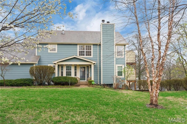 3110 Autumn Shores Dr, Maryland Heights, MO 63043 - view of front of property with a chimney and a front lawn