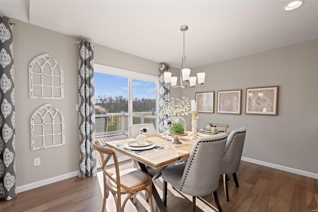 22712 Danison Dr, Warrenton, MO 63383 - dining room featuring a chandelier, baseboards, wood finished floors, and recessed lighting