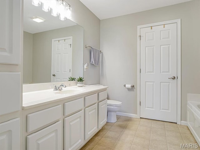508 Southview Dr, Waterloo, IL 62298 - full bath with vanity, tile patterned flooring, a bath, toilet, and baseboards