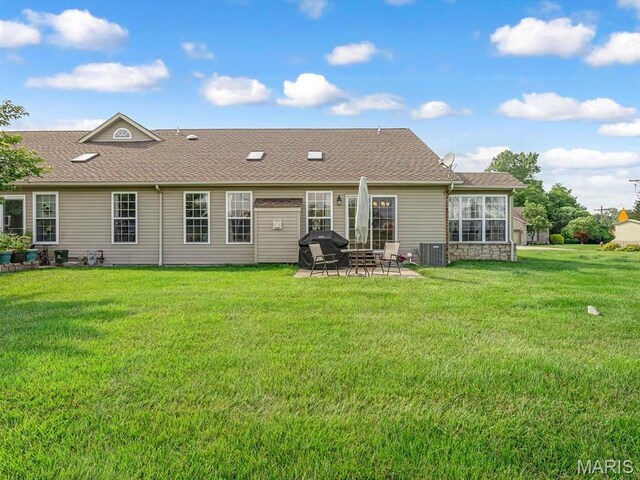 508 Southview Dr, Waterloo, IL 62298 - rear view of house with a patio, a yard, a shingled roof, and central AC