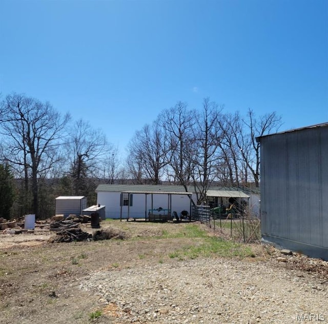 8336 Cedar Fork Rd, New Haven, MO 63068 - rear view of house with an outbuilding