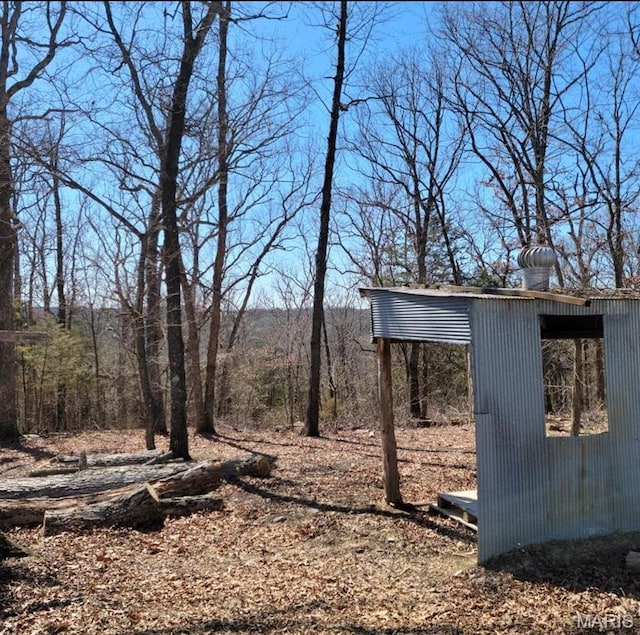 8336 Cedar Fork Rd, New Haven, MO 63068 - view of yard with a forest view