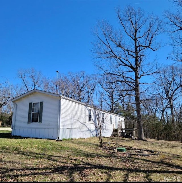 8336 Cedar Fork Rd, New Haven, MO 63068 - view of side of property featuring a lawn