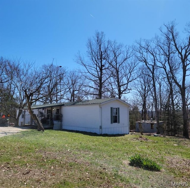 8336 Cedar Fork Rd, New Haven, MO 63068 - view of home's exterior featuring a yard