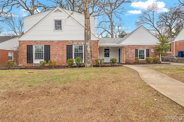 83 Chafford Woods, Saint Louis, MO 63144 - view of front of home with brick siding and a front lawn