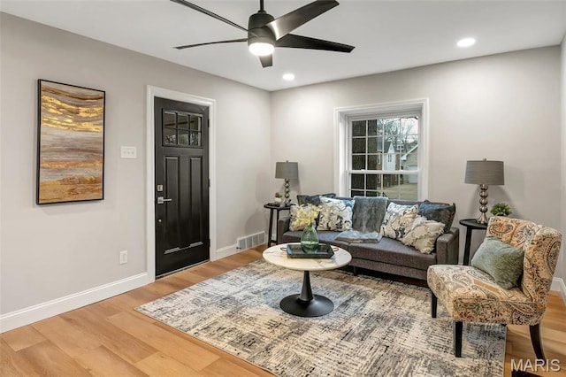 83 Chafford Woods, Saint Louis, MO 63144 - living room featuring light wood-style flooring, ceiling fan, and recessed lighting