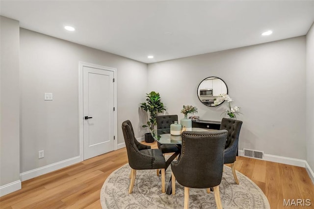 83 Chafford Woods, Saint Louis, MO 63144 - dining room featuring recessed lighting and light wood-style floors