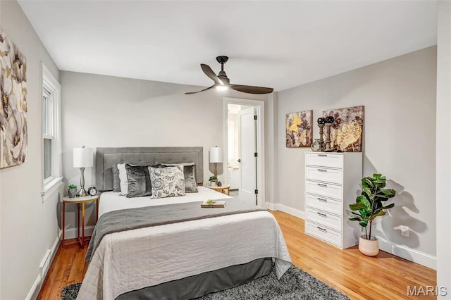 83 Chafford Woods, Saint Louis, MO 63144 - bedroom featuring light wood-style flooring and a ceiling fan