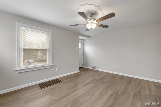 9515 Edmund Ave, Saint Louis, MO 63114 - empty room featuring wood finished floors and a ceiling fan