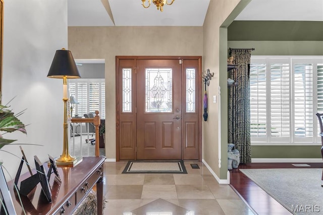 13463 Keller Ridge Cv, Saint Louis, MO 63128 - foyer featuring plenty of natural light and baseboards