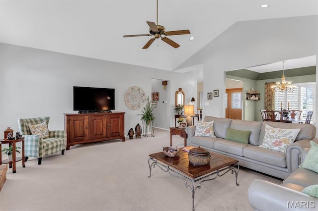 13463 Keller Ridge Cv, Saint Louis, MO 63128 - living area featuring a chandelier, light colored carpet, ceiling fan, high vaulted ceiling, and recessed lighting