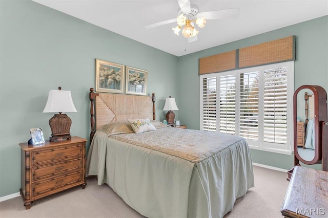 13463 Keller Ridge Cv, Saint Louis, MO 63128 - bedroom featuring light colored carpet, baseboards, and multiple windows