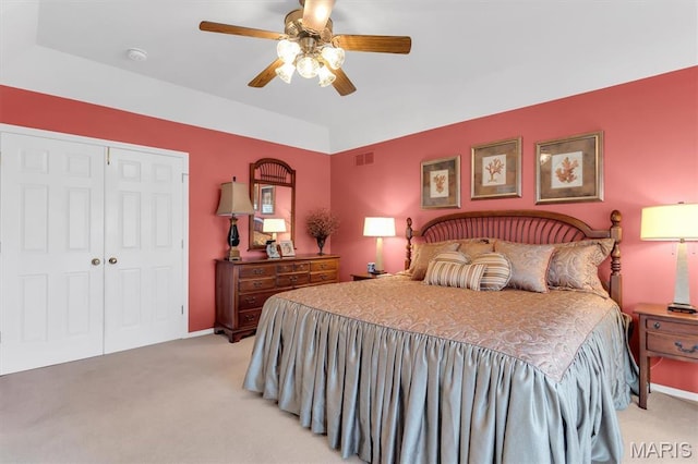 13463 Keller Ridge Cv, Saint Louis, MO 63128 - bedroom featuring light carpet, a closet, and a ceiling fan