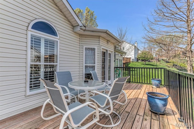 13463 Keller Ridge Cv, Saint Louis, MO 63128 - wooden deck featuring outdoor dining area and a lawn