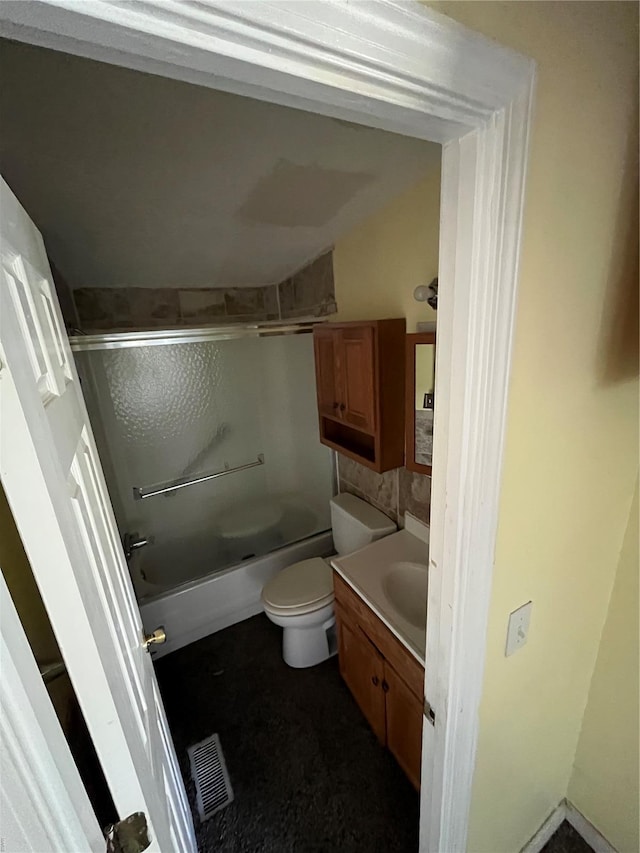 2717 Creon Ct, De Soto, MO 63020 - bathroom featuring toilet, vanity, and combined bath / shower with glass door