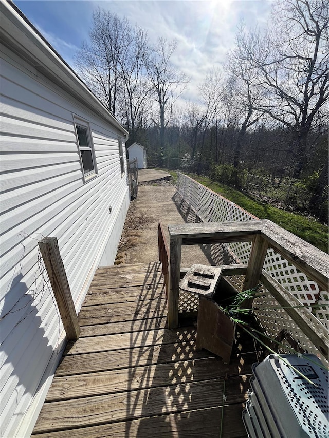 2717 Creon Ct, De Soto, MO 63020 - wooden terrace featuring an outbuilding