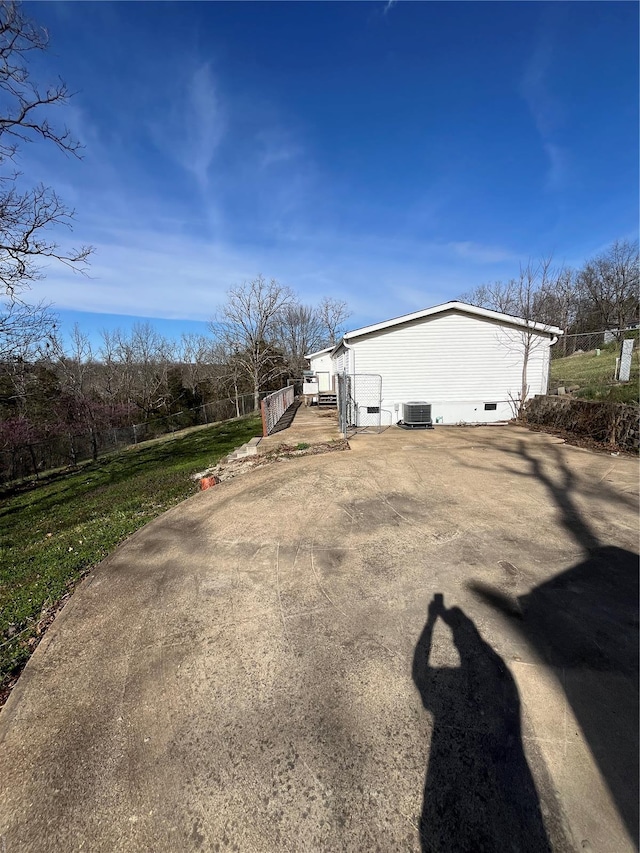 2717 Creon Ct, De Soto, MO 63020 - view of yard with central air condition unit and a wooden deck