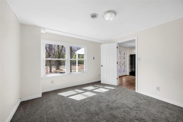 1300 Hudson Rd, Saint Louis, MO 63135 - empty room with carpet floors and baseboards