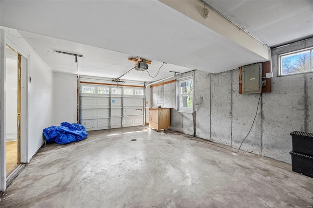 1300 Hudson Rd, Saint Louis, MO 63135 - garage featuring electric panel and a garage door opener
