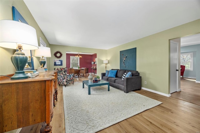 1300 Hudson Rd, Saint Louis, MO 63135 - living room featuring light wood finished floors and baseboards