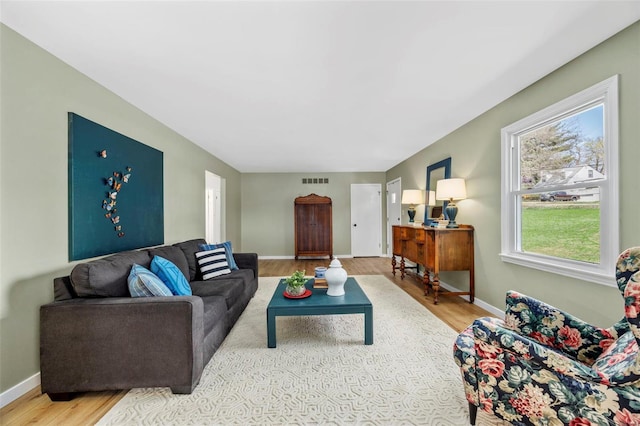 1300 Hudson Rd, Saint Louis, MO 63135 - living area featuring wood finished floors and baseboards