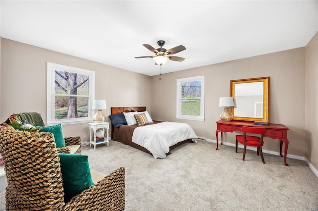 1300 Hudson Rd, Saint Louis, MO 63135 - carpeted bedroom featuring baseboards and a ceiling fan