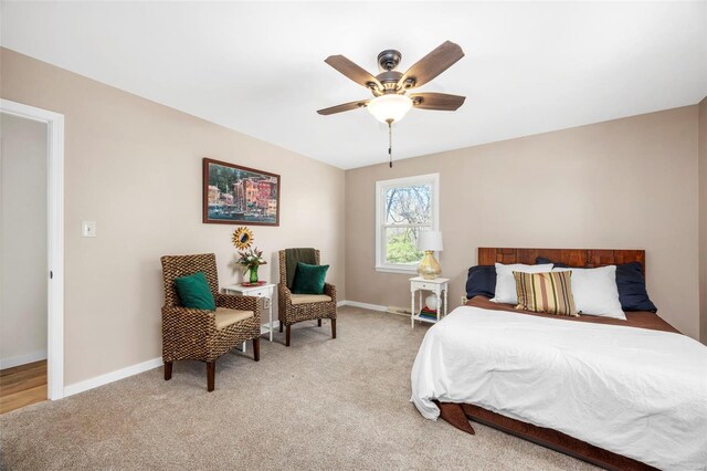 1300 Hudson Rd, Saint Louis, MO 63135 - bedroom featuring light colored carpet, baseboards, and a ceiling fan
