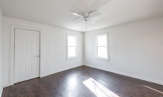 223 Warren St, Sullivan, MO 63080 - empty room with wood finished floors, ceiling fan, and baseboards