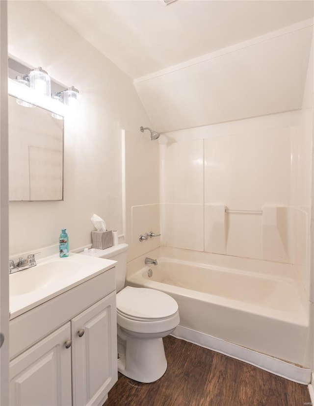 223 Warren St, Sullivan, MO 63080 - full bathroom with lofted ceiling, wood finished floors, toilet, vanity, and shower / tub combination