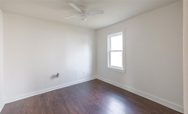 223 Warren St, Sullivan, MO 63080 - unfurnished room with dark wood-type flooring, baseboards, and ceiling fan