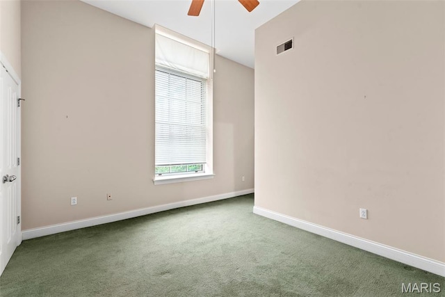 1515 Lafayette Ave Unit 316, Saint Louis, MO 63104 - spare room with a ceiling fan, carpet floors, and baseboards