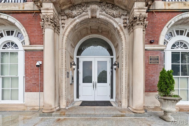 1515 Lafayette Ave Unit 316, Saint Louis, MO 63104 - doorway to property featuring brick siding and french doors