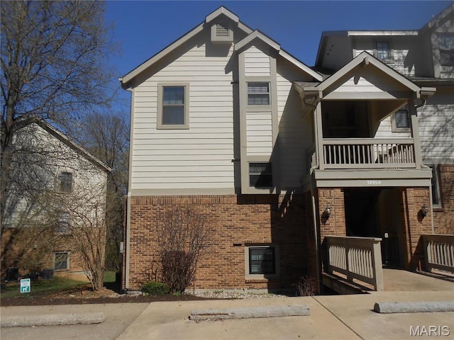 12954 Bryce Canyon Dr Unit E, Maryland Heights, MO 63043 - multi unit property featuring a balcony and brick siding