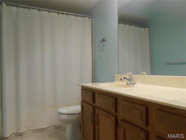 12954 Bryce Canyon Dr Unit E, Maryland Heights, MO 63043 - bathroom featuring toilet, tile patterned floors, and vanity