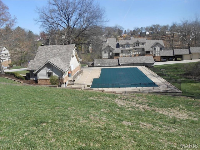 12954 Bryce Canyon Dr Unit E, Maryland Heights, MO 63043 - view of swimming pool featuring a patio and a residential view