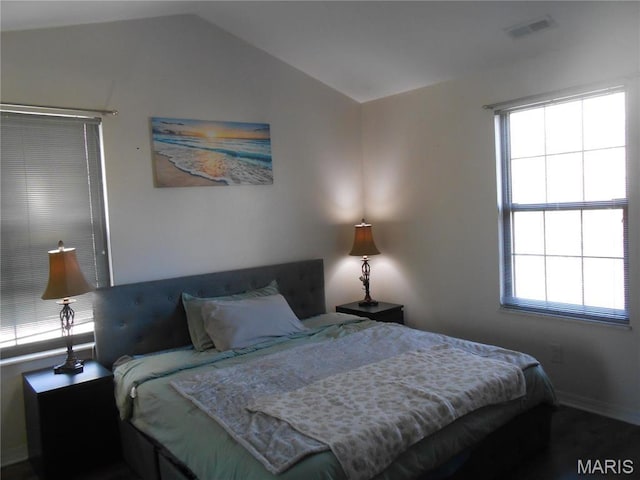 12954 Bryce Canyon Dr Unit E, Maryland Heights, MO 63043 - bedroom with lofted ceiling and baseboards