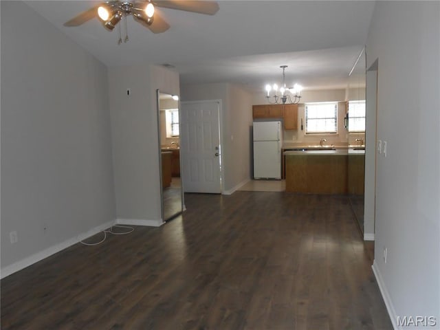 12954 Bryce Canyon Dr Unit E, Maryland Heights, MO 63043 - unfurnished living room with a ceiling fan, a chandelier, and dark wood-style flooring