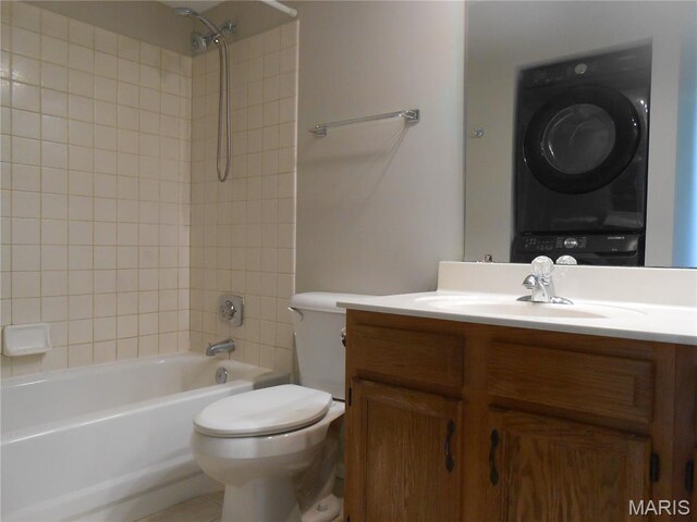 12954 Bryce Canyon Dr Unit E, Maryland Heights, MO 63043 - bathroom with stacked washing machine and dryer, vanity, and tub / shower combination