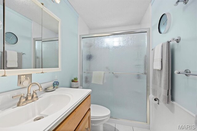 10 Mallard Dr, Carlyle, IL 62231 - bathroom featuring a shower stall, vanity, toilet, and tile patterned flooring
